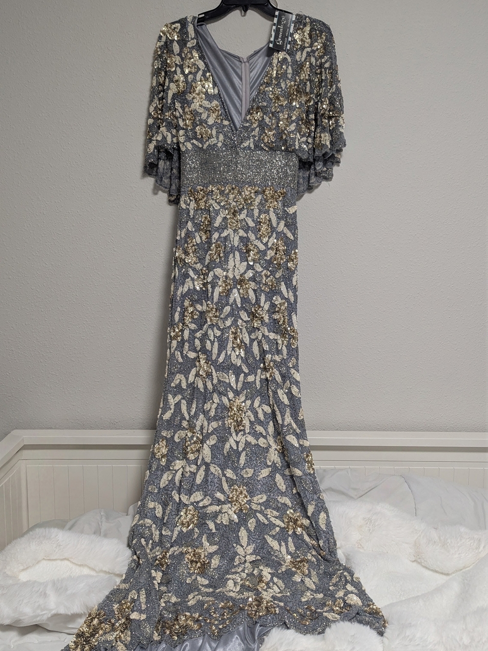 Mac Duggal Grey Gold evening gown featuring an allover sequin Floral Cape Sleeve